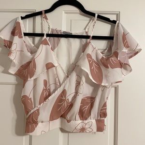 White and beige leaves off the shoulder crop top